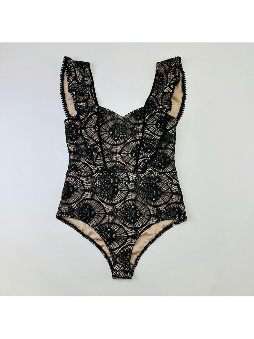 Tea & Cup NWT black lace nude bodysuit Fits Medium ruffles
Romantic